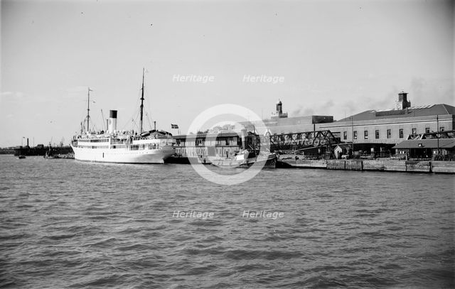 The 'Suecia' at the passenger landing stage at Tilbury, Essex, c1945-c1965.  Artist: SW Rawlings