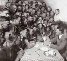 The supreme SA leader Adolf Hitler with his comrades 1938. Creator: Unknown