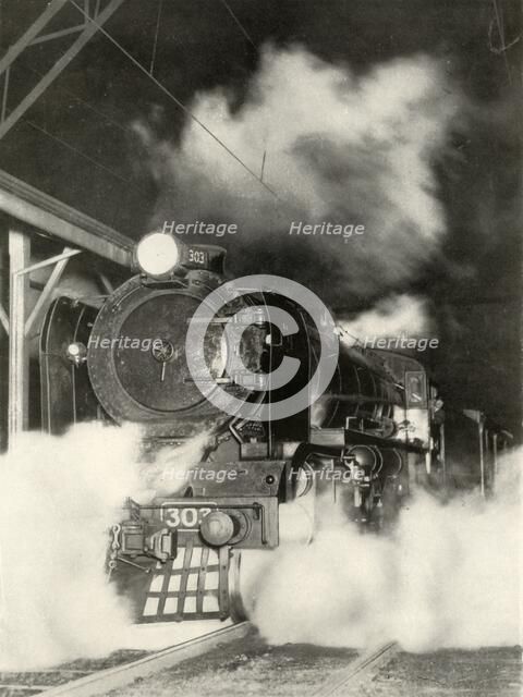 'The "Sydeny Limited" leaving Spencer Street Station, Melbourne, at 6 p.m', 1935-36. Creator: Unknown.