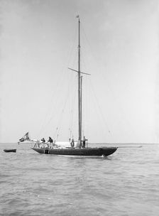 The sailing yacht Rollo at anchor, 1911. Creator: Kirk & Sons of Cowes