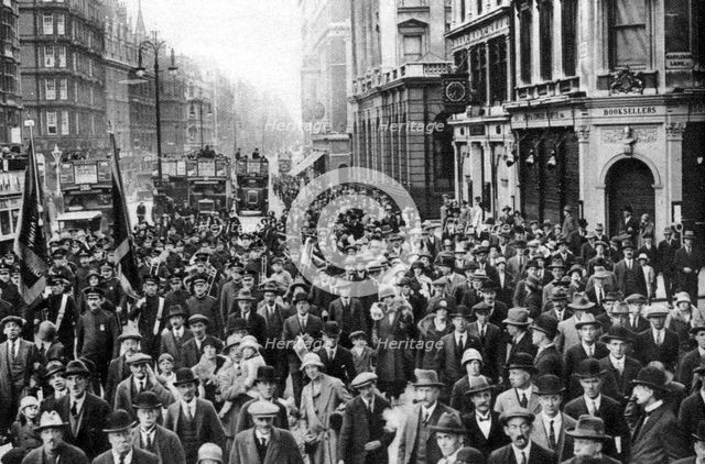 The Salvation Army marching down Oxford Street, London, 1926-1927. Artist: Unknown