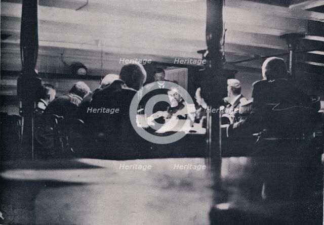 The scene on the Victory during the court-martial, 1906. Artist: Unknown