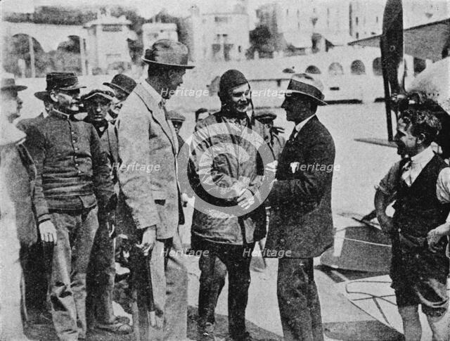 The Schneider Trophy: Howard Pixton talking to Jacques Schneider after his victory, 1914 (1934). Artist: Flight Photo.