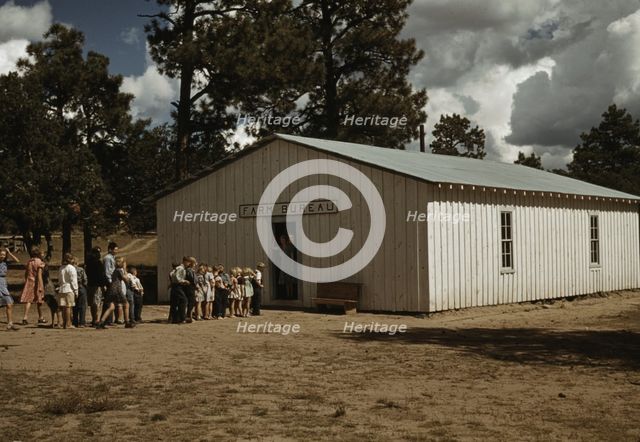 The school at Pie Town, New Mexico in the Farm Bureau building, 1940. Creator: Russell Lee.