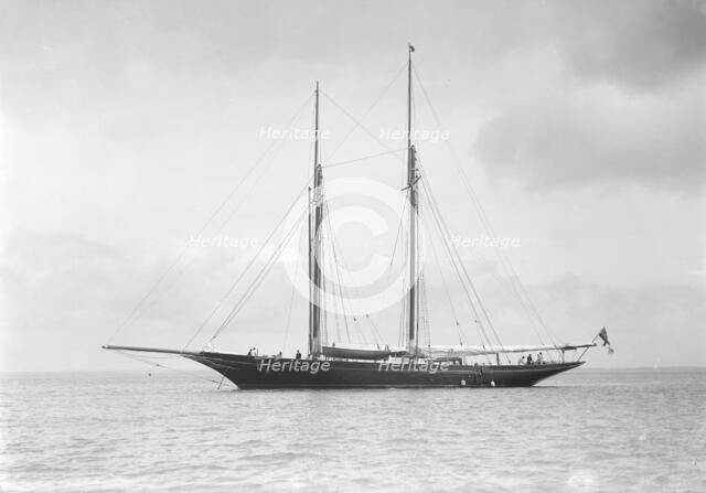 The schooner 'Allah Karim' at anchor, 1912. Creator: Kirk & Sons of Cowes.
