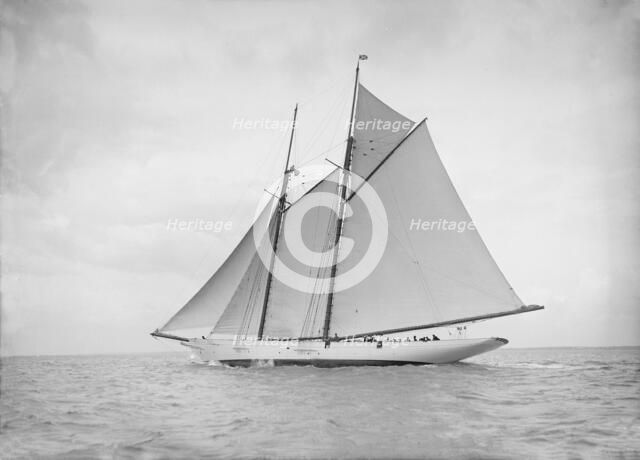 The schooner 'Cetonia' under way, 1911. Creator: Kirk & Sons of Cowes.