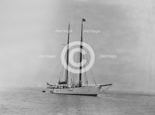 The schooner 'Dwyn-Wen' at anchor, 1920. Creator: Kirk & Sons of Cowes.