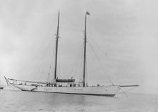 The schooner Dwyn-Wen at anchor, 1920. Creator: Kirk & Sons of Cowes