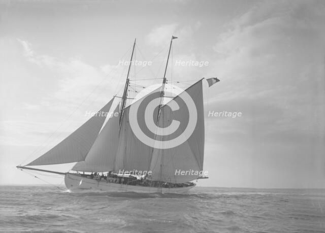 The schooner 'Halcyon' under sail, 1911. Creator: Kirk & Sons of Cowes.