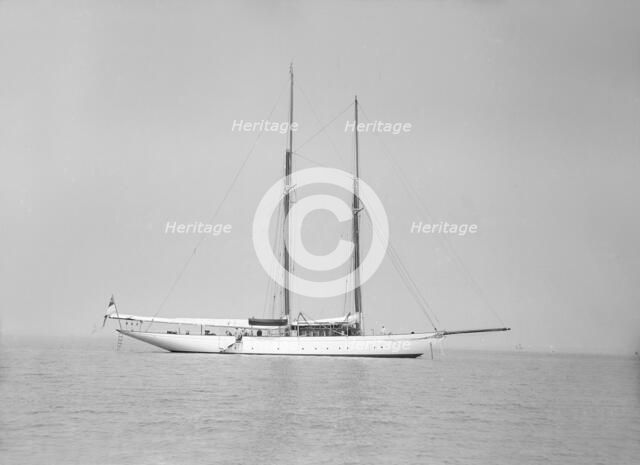 The schooner 'Joyance' at anchor, 1913. Creator: Kirk & Sons of Cowes.