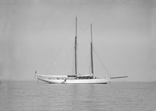 The schooner Joyance at anchor, 1913. Creator: Kirk & Sons of Cowes