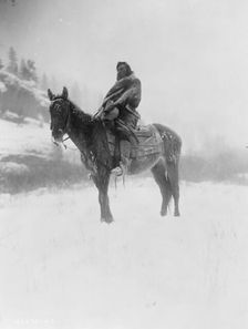 The scout in winter-Apsaroke, c1908. Creator: Edward Sheriff Curtis