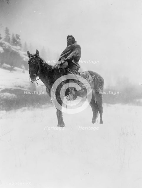 The scout in winter-Apsaroke, c1908. Creator: Edward Sheriff Curtis.