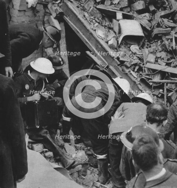 'The search goes on', 1941 (1942). Artist: Unknown.