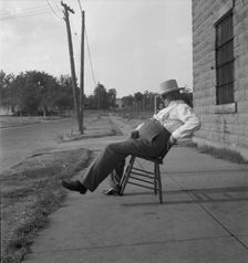 The sheriff of McAlester, Oklahoma, sitting in front of the jail, 1936. Creator: Dorothea Lange