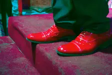 The shiny red shoes of one of the performers from Buena Vista Social Club, Havana, Cuba, 2024. Creator: Ethel Davies
