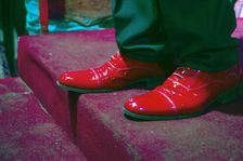 The shiny red shoes of one of the performers from Buena Vista Social Club, Havana, Cuba, 2024. Creator: Ethel Davies