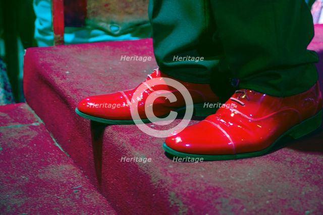 The shiny red shoes of one of the performers from Buena Vista Social Club, Havana, Cuba, 2024. Creator: Ethel Davies.