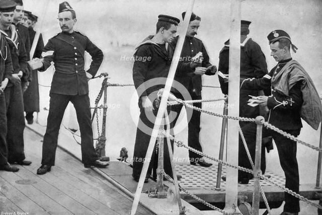 The ship's postman coming on board, 1896.Artist: Gregory & Co