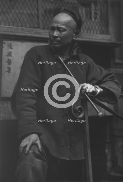 The shoe maker, Chinatown, San Francisco, between 1896 and 1906. Creator: Arnold Genthe.