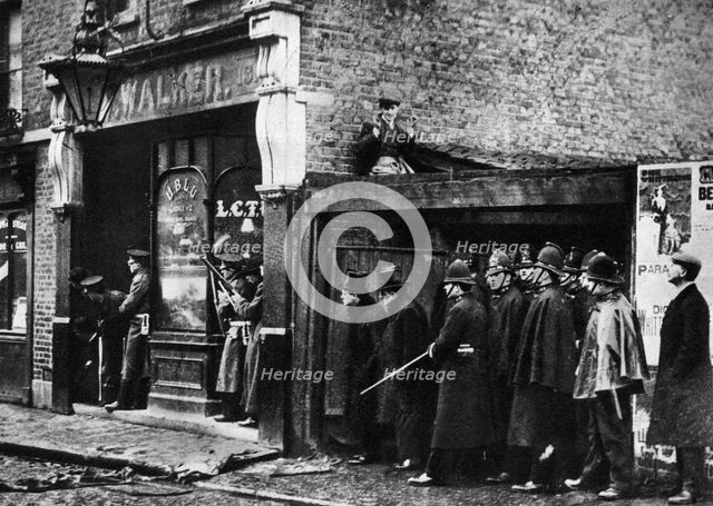 The Sidney Street siege, Whitechapel, London, 1911, (1935). Artist: Unknown