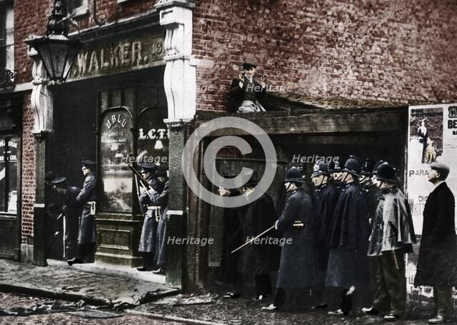 The Sidney Street siege, Whitechapel, London, 1911, (1935).  Artist: Unknown.