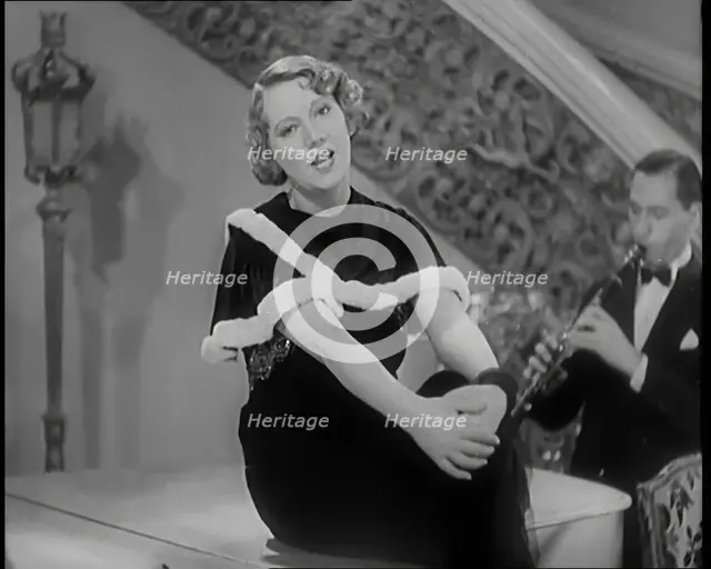 The Singer Elsie Carlisle and Her Band Performing a Song About Her Boyfriend Who Has Gone..., 1931. Creator: British Pathe Ltd.