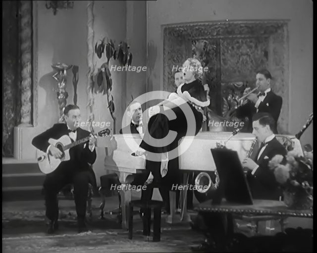 The Singer Elsie Carlisle and Her Band Performing a Song About Her Boyfriend Who Has Gone..., 1931. Creator: British Pathe Ltd.