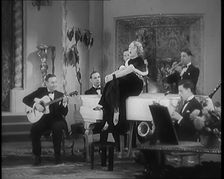 The Singer Elsie Carlisle and Her Band Performing a Song About Her Boyfriend Who Has Gone..., 1931. Creator: British Pathe Ltd