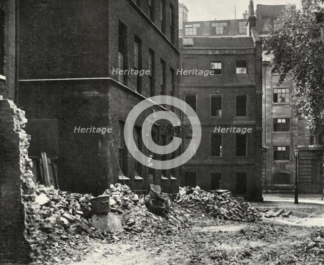 'The Site of the Gateway from Fetter Lane and the Derelict Houses Awaiting Demolition', 1934. Creator: Unknown.