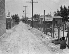 The slums of Brawley, Homes of Mexican field workers, Imperial Valley, California, 1935. Creator: Dorothea Lange