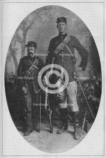 'The Smallest Man and the Biggest Man in the Boer Army', 1902. Artist: Unknown.