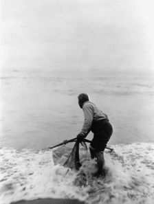 The smelt fisher-Trinidad Yurok, c1923. Creator: Edward Sheriff Curtis