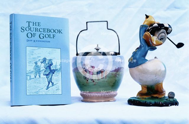 "The Sourcebook of Golf", ornamental ware, Donald Duck figure, 1930-81. Creator: Unknown.