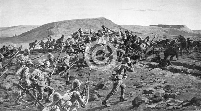 The South Lancashires Storming the Boer Trenches at Pieters Hill, Natal', 1900 (1903).Artist: William Barnes Wollen