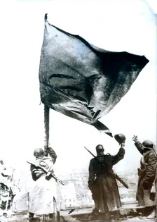 The Soviet flag raised above the Reichstag, Berlin, World War II, May 1945. Creator: Unknown