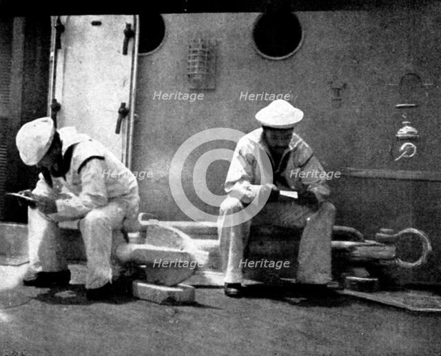 The Spanish-American War: American naval and military types - reading letters in a quiet spot, 1898. Creator: Unknown.