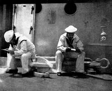 The Spanish-American War: American naval and military types - reading letters in a quiet spot, 1898. Creator: Unknown