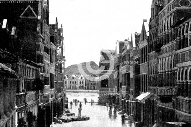 The Spanish-American War: Willemstad Harbour - approach to the drawbridge from the town, 1898. Creator: Unknown.