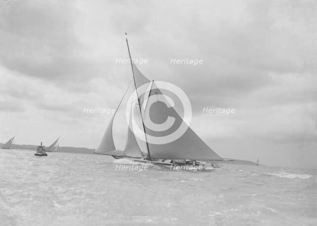 The spectacular 15 Metre 'Vanity' sailing in a good wind, 1912. Creator: Kirk & Sons of Cowes.