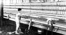 The spinning-mule, on which both warp and weft are spun, 1909. Creator: Unknown