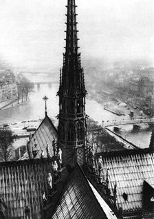 The spire of Notre Dame seen from the towers, Paris, 1931.Artist: Ernest Flammarion