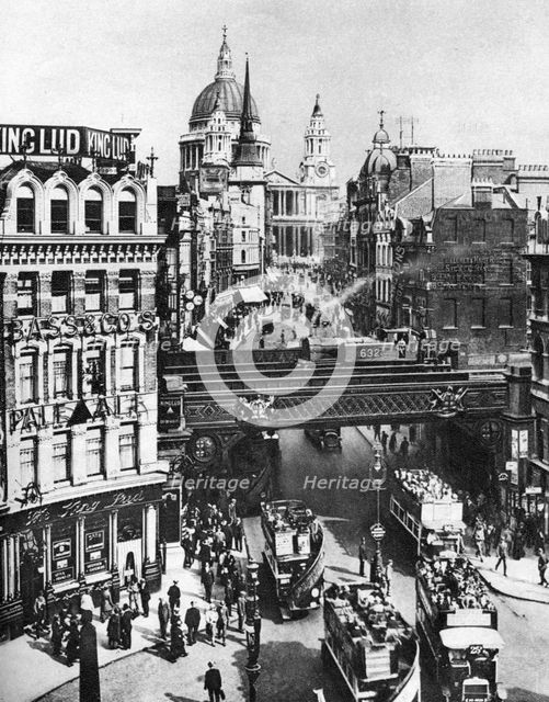 The spire of St Martin, Ludgate silhouetted against the bulk of St Paul's, London, 1926-1927. Artist: Frith