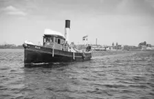 The tugboat Ran leaving Landskrona, harbour, Sweden, 1935. Creator: Unknown