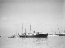 The twin screw 80ft motor yacht Bystander at anchor, 1934. Creator: Kirk & Sons of Cowes