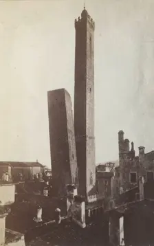 The Two Towers, AsinelIi and Garisenda, from the north, Bologna, between 1880-1886. Creator: Giorgio Sommer