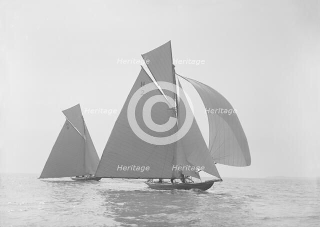 The two early 8 Metre class 'Verbena' and 'Termagent' racing in a gentle wind, 1911. Creator: Kirk & Sons of Cowes.
