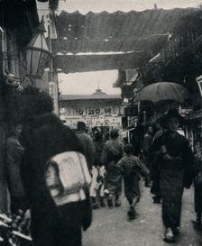 The theatre street in Kyoto is one of the most interesting highways in the world c1900, (1921). Artist: Julian Leonard Street