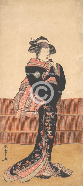 The Third Azuma Tozo as a Woman in a Black Kimono, probably 1782. Creator: Shunsho.