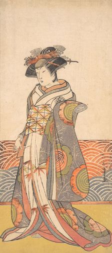 The Third Segawa Kikunojo as a Woman Standing in a Room Having a Wave-pattern Dado, ca. 1779. Creator: Shunsho